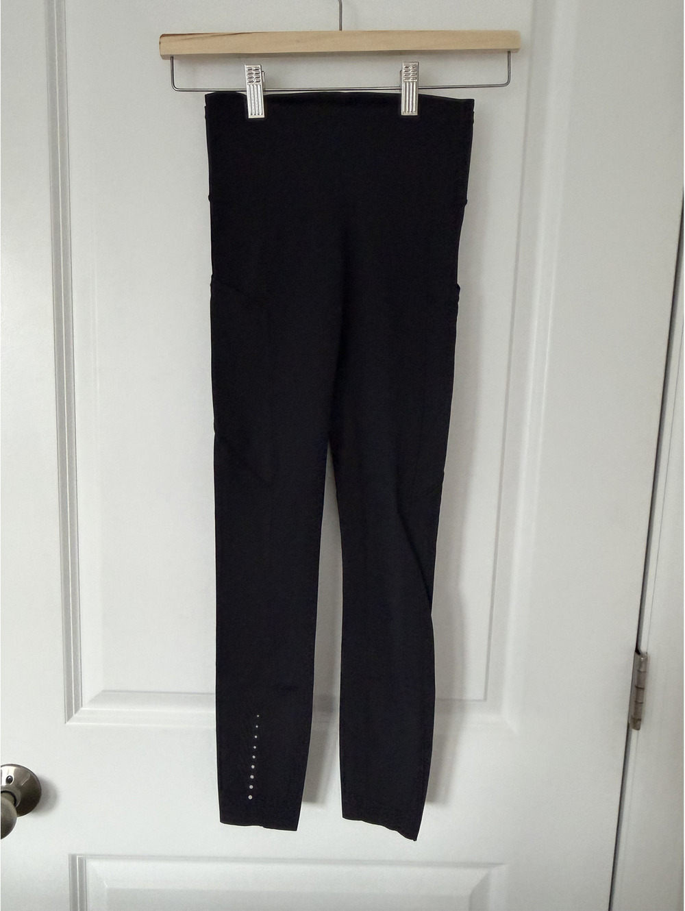 Lululemon Black High-Rise Leggings Size 2 with Side Pockets and Reflective Detai